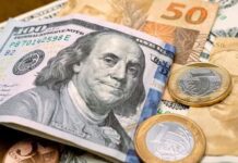 Dólar sobe com aversão a risco no mundo