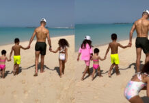 Amoroso! Cristiano Ronaldo passeia na praia de mãos dadas com os filhos