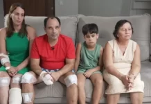 Família sobrevive após carro ser esmagado entre dois caminhões na BR-101